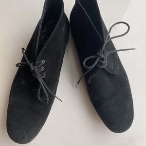 black suede shoes with a low wooden heel